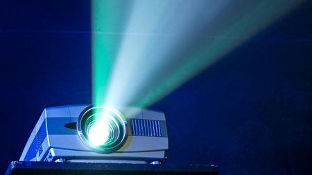 best projector for video: beaming green and blue light